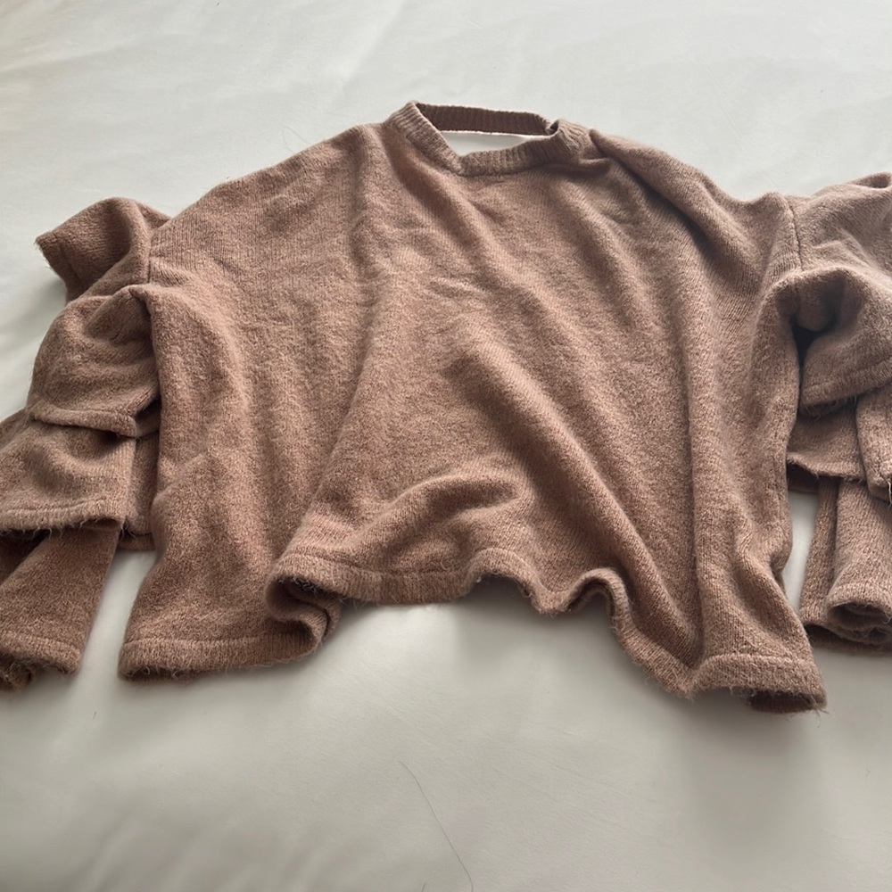 Beige ruffle sweater with v back